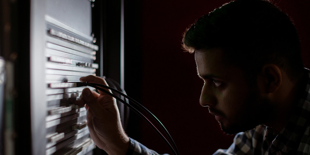 A man working on a server