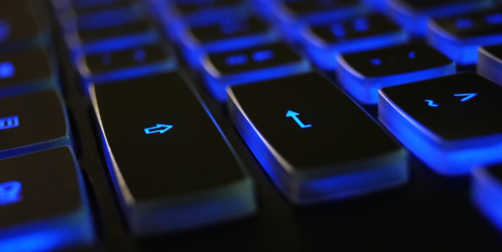 Keyboard keys with blue light underneath