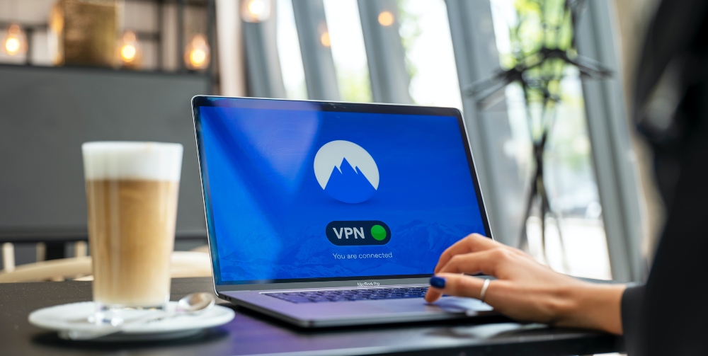 VPN on laptop screen in public