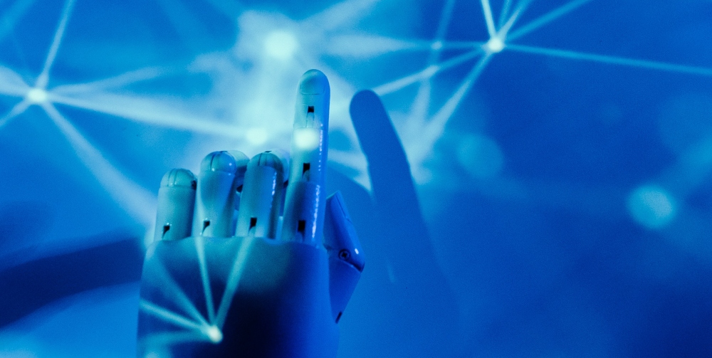 robot hand on blue background